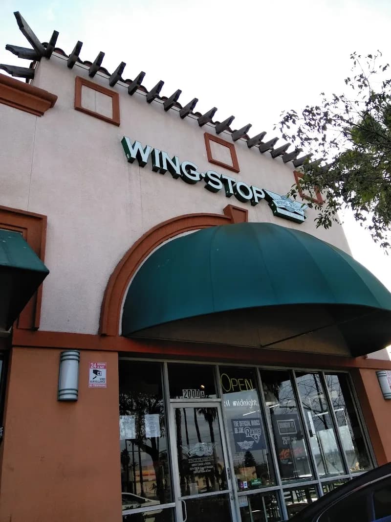 Wingstop storefront outside and inside view at 2000 Long Beach Blvd in Long Beach, California