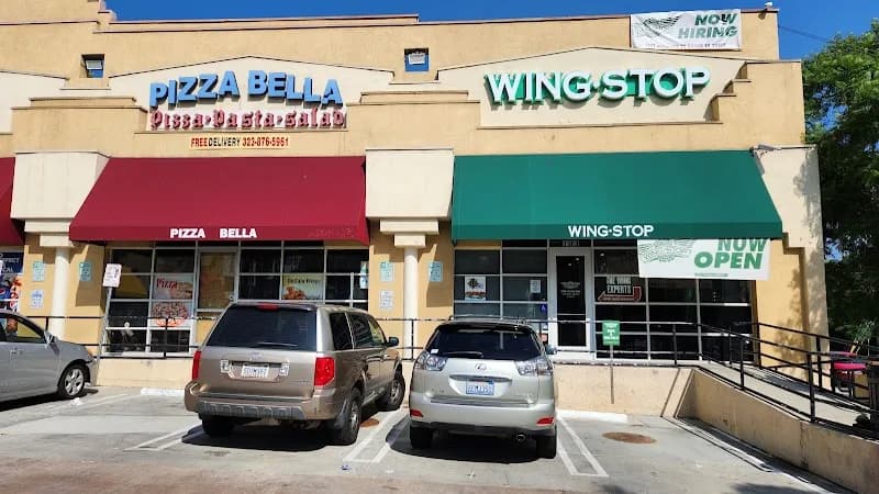 Wingstop storefront outside and inside view at 1900 N. Highland Ave in Los Angeles, California