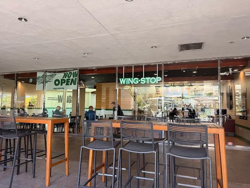 Wingstop storefront outside and inside view at 350 S. Grand Ave in Los Angeles, California