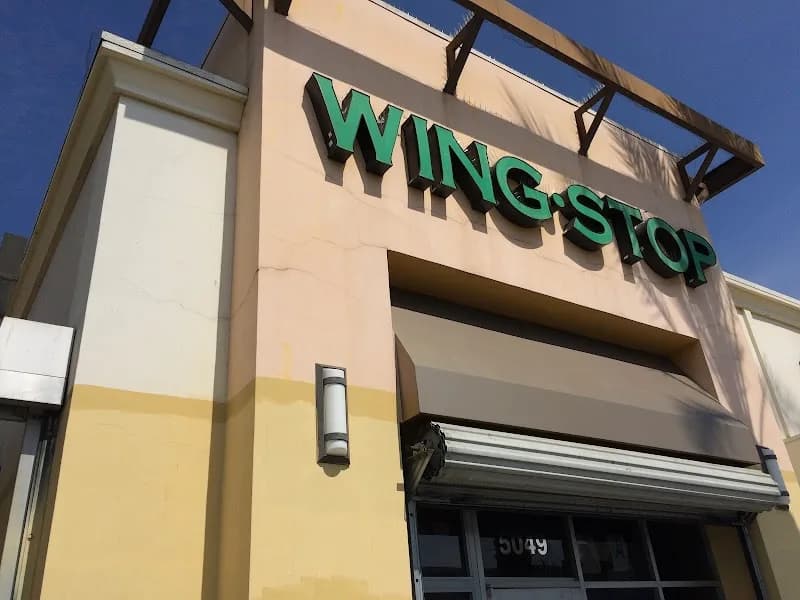Wingstop storefront outside and inside view at 5049 Whittier Blvd in Los Angeles, California