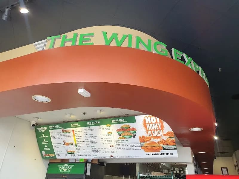 Wingstop storefront outside and inside view at 4725 Venice Blvd in Los Angeles, California
