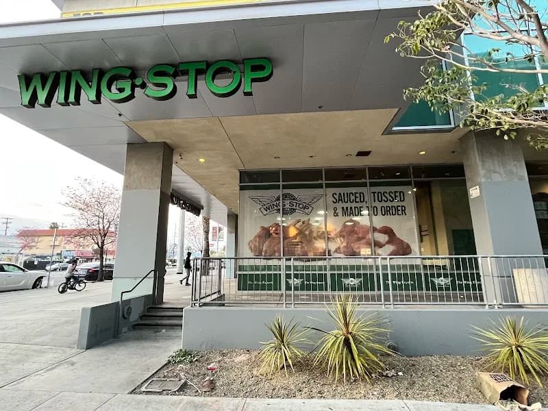 Wingstop storefront outside and inside view at 8330 S Vermont Ave in Los Angeles, California