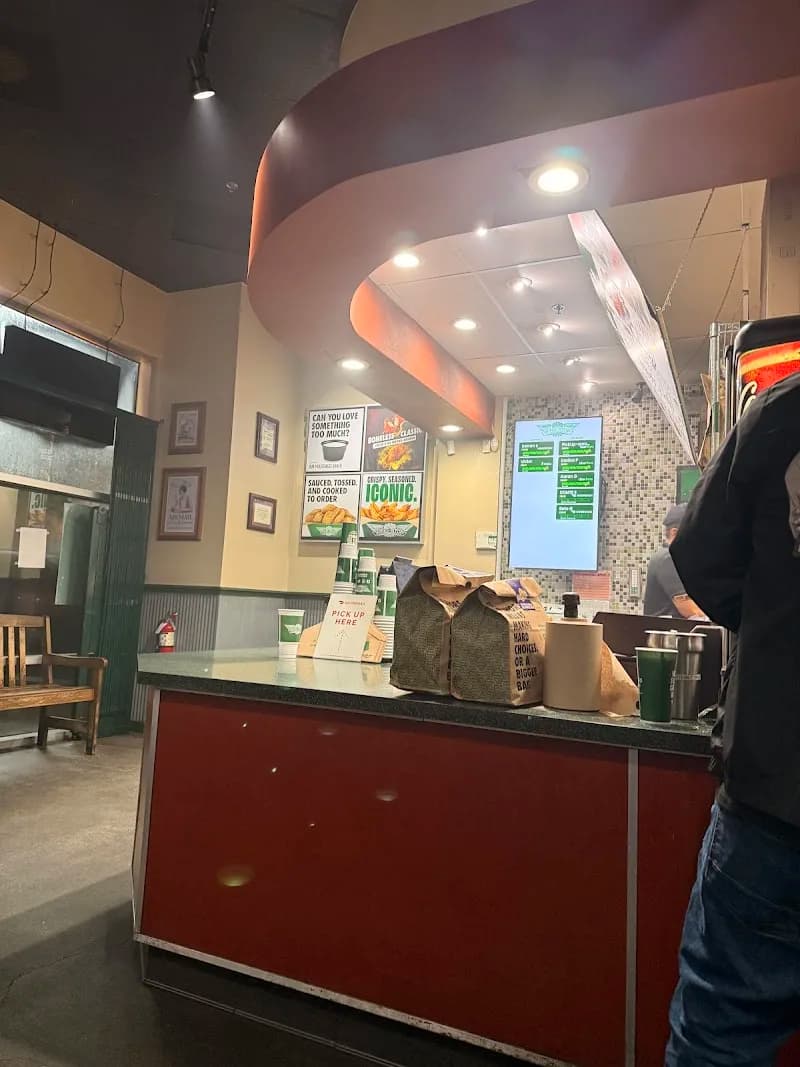 Wingstop storefront outside and inside view at 8985 Venice Blvd #C-1C in Los Angeles, California