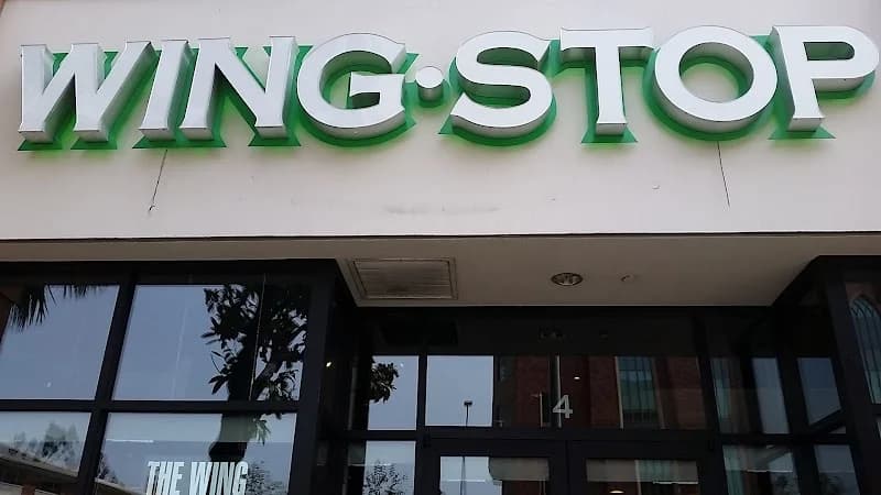 Wingstop storefront outside and inside view at 3584 S. Figueroa St. in Los Angeles, California
