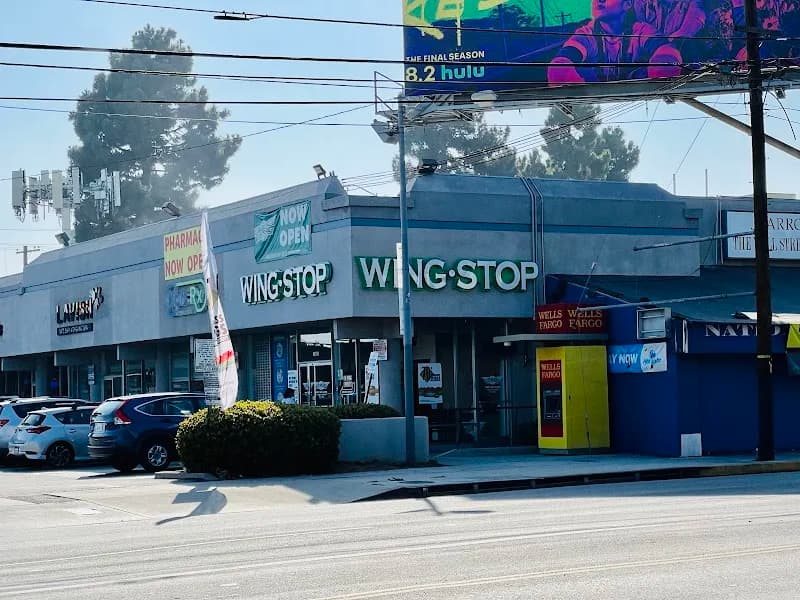 Wingstop storefront outside and inside view at 11201 National Blvd in Los Angeles, California