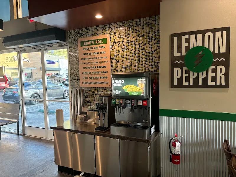 Wingstop storefront outside and inside view at 2030 W. 8th Street in Los Angeles, California