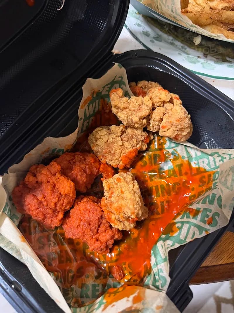 Wingstop storefront outside and inside view at 1160 Arnold Dr F in Martinez, California