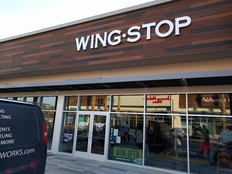 Wingstop storefront outside and inside view at 10374 Sepulveda Blvd in Mission Hills, California