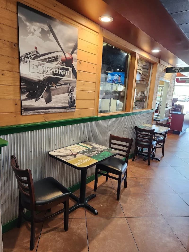 Wingstop storefront outside and inside view at 4480 Holt Blvd Unit C in Montclair, California
