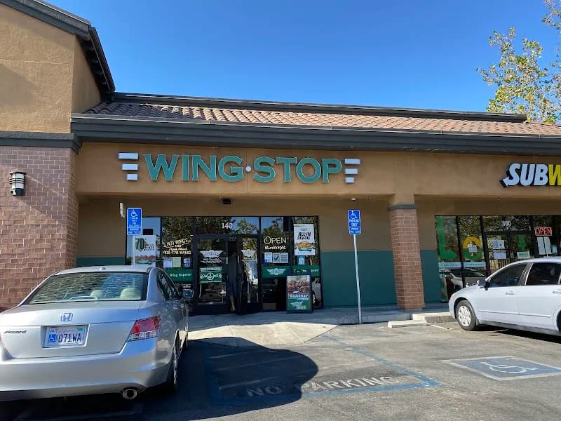 Wingstop storefront outside and inside view at 250 Cochrane Plaza #140 in Morgan Hill, California