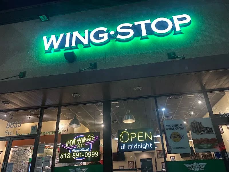 Wingstop storefront outside and inside view at 8633 Woodley Avenue in North Hills, California