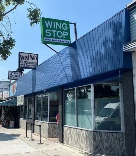 Wingstop storefront outside and inside view at 5643 Lankershim blvd. in North Hollywood, California