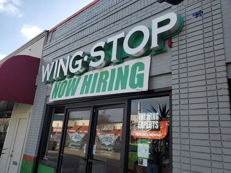 Wingstop storefront outside and inside view at 4005 Macarthur Blvd in Oakland, California