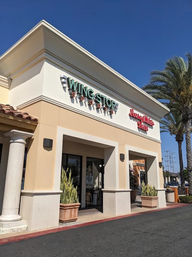 Wingstop storefront outside and inside view at 1541 E Katella Ave in Orange, California