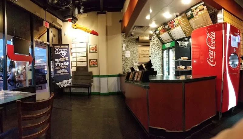 Wingstop storefront outside and inside view at 2551 E Avenue S Ste L in Palmdale, California