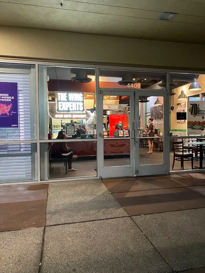 Wingstop storefront outside and inside view at 4406 Century Blvd in Pittsburg, California