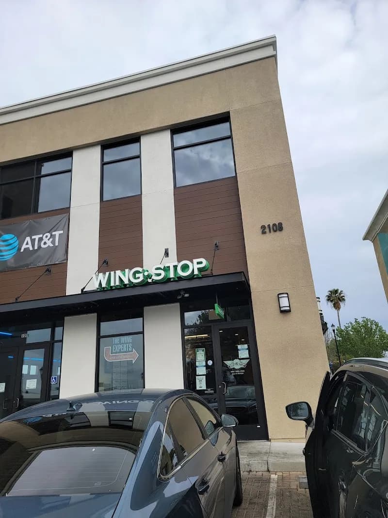 Wingstop storefront outside and inside view at 2108 Railroad Ave Suite 110 in Pittsburg, California