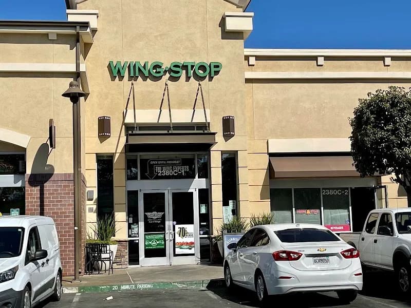 Wingstop storefront outside and inside view at 2380 Monument Blvd Suite C-1 in Pleasant Hill, California