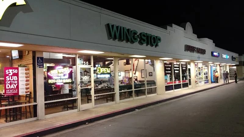 Wingstop storefront outside and inside view at 756 E Arrow Hwy in Pomona, California