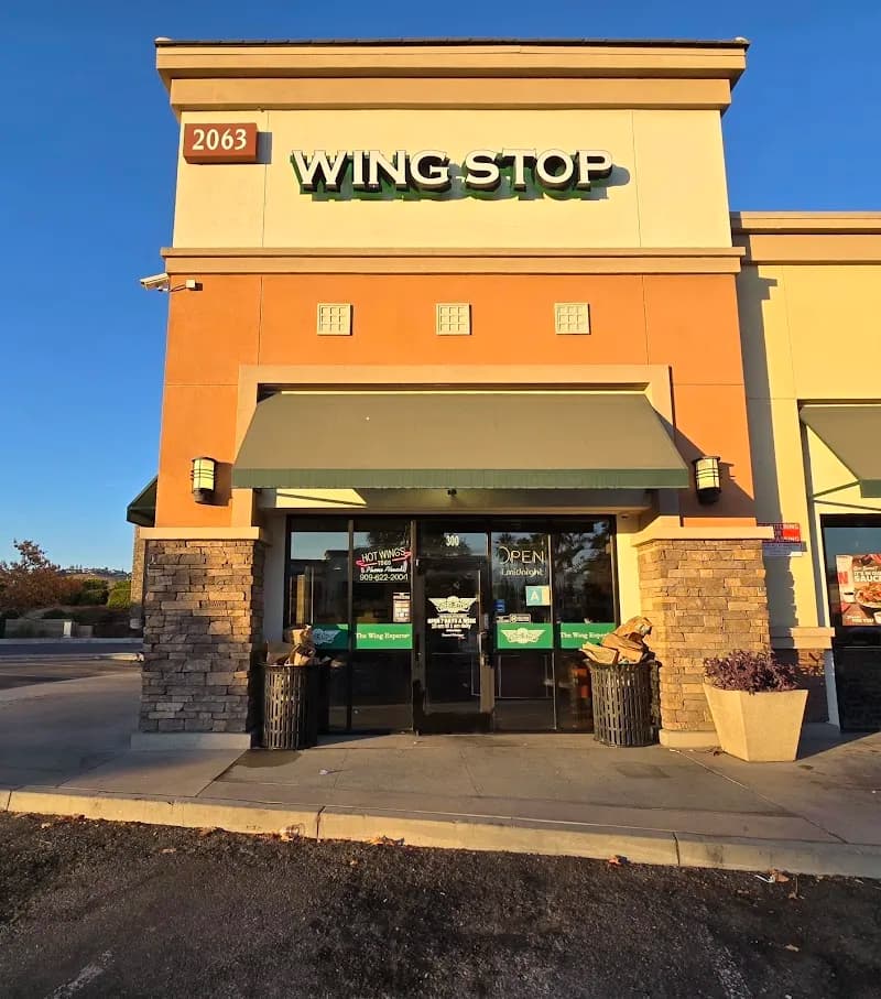 Wingstop storefront outside and inside view at 2063 Rancho Valley Dr Ste 300 in Pomona, California