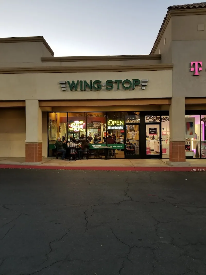 Wingstop storefront outside and inside view at 1375 W Henderson Ave in Porterville, California