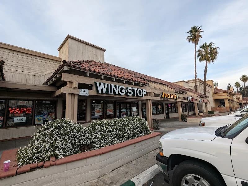 Wingstop storefront outside and inside view at 2995 Van Buren Blvd in Riverside, California