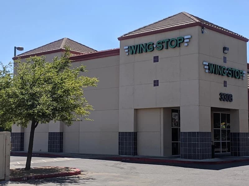 Wingstop storefront outside and inside view at 3308 El Camino Ave Ste 100 in Sacramento, California