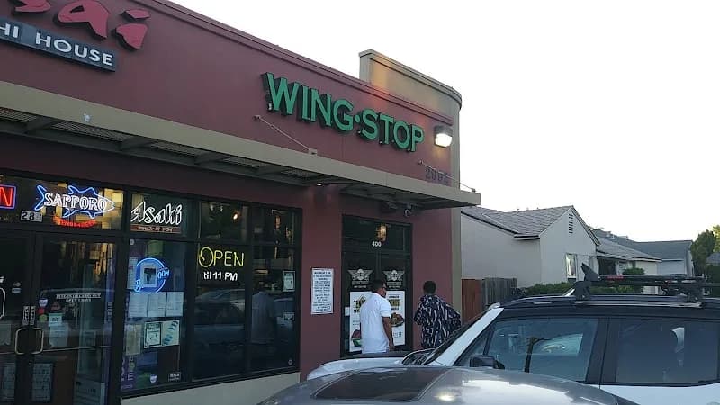 Wingstop storefront outside and inside view at 2992 65th St Ste 400 in Sacramento, California
