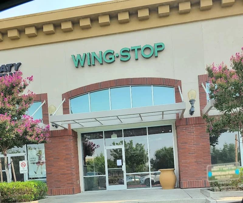 Wingstop storefront outside and inside view at 3541 N Freeway Blvd in Sacramento, California