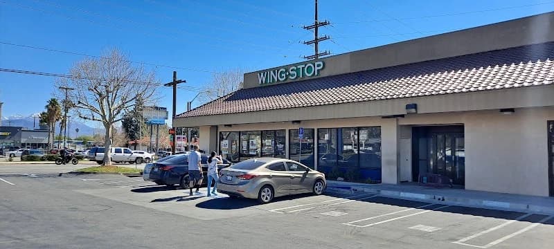 Wingstop storefront outside and inside view at 1598 E. Highland Ave in San Bernardino, California