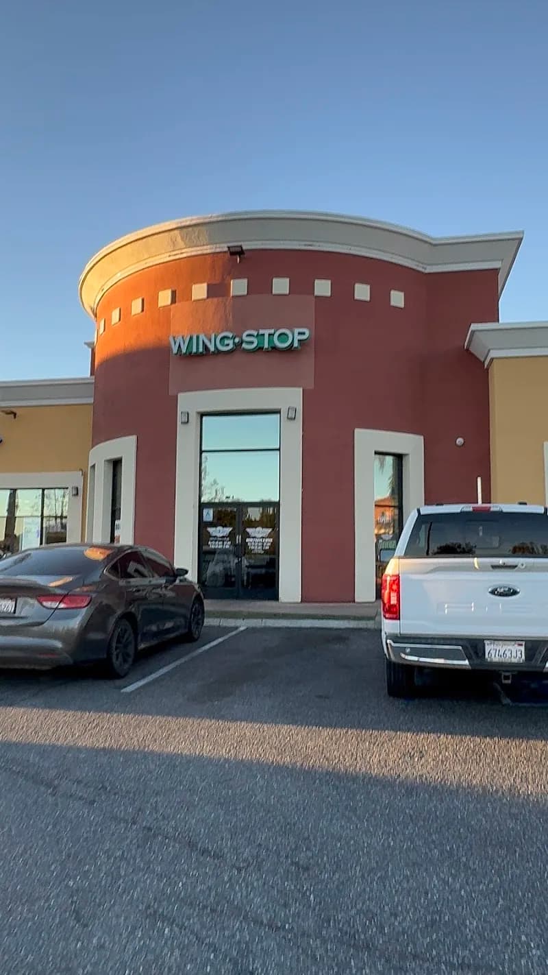 Wingstop storefront outside and inside view at 5244 University Parkway Unit H in San Bernardino, California