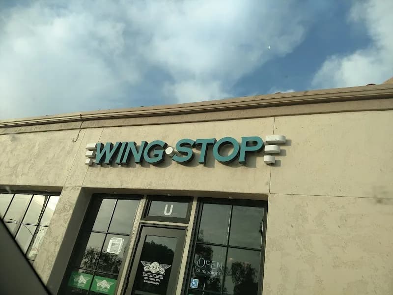 Wingstop storefront outside and inside view at 800 Avenida Pico Ste U in San Clemente, California