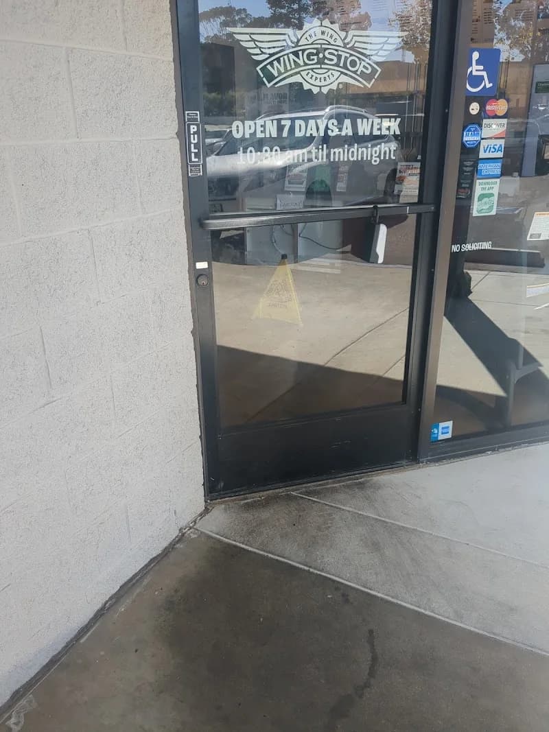 Wingstop storefront outside and inside view at 7612 Linda Vista Rd in San Diego, California