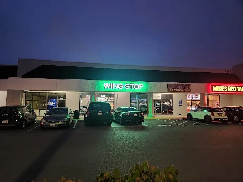 Wingstop storefront outside and inside view at 3365 Rosecrans St Ste B in San Diego, California