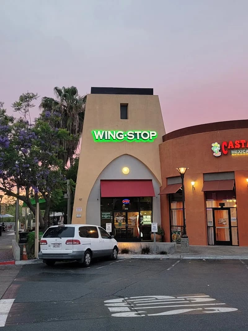 Wingstop storefront outside and inside view at 310 Euclid Ave Ste 402 in San Diego, California