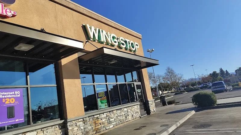 Wingstop storefront outside and inside view at 1302 E 17th St. in Santa Ana, California