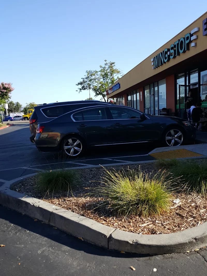 Wingstop storefront outside and inside view at 2821 El Camino Real in Santa Clara, California
