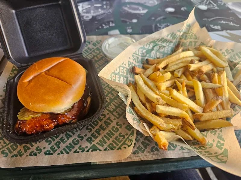 Wingstop storefront outside and inside view at 27959 Seco Canyon Road in Santa Clarita, California