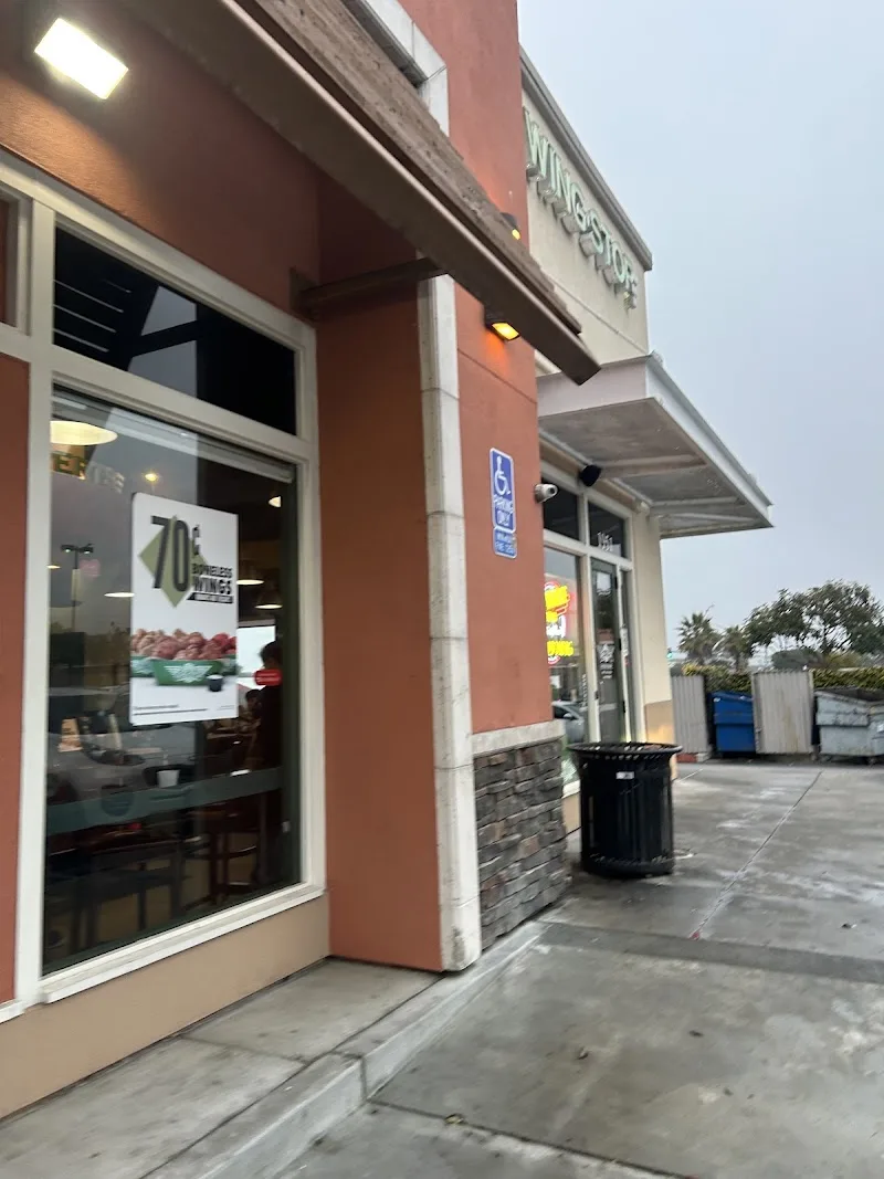 Wingstop storefront outside and inside view at 1951 Fremont Blvd in Seaside, California