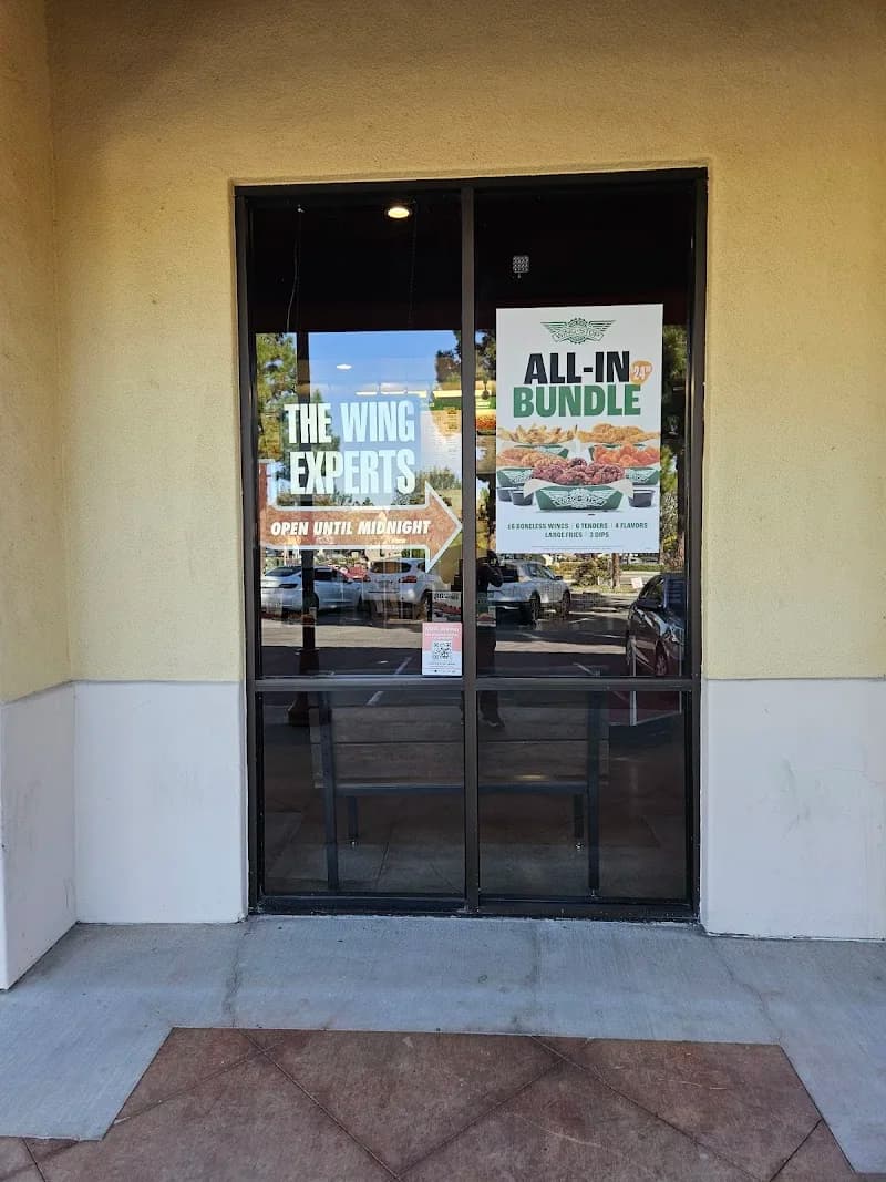 Wingstop storefront outside and inside view at 2432 Erringer Road in Simi Valley, California