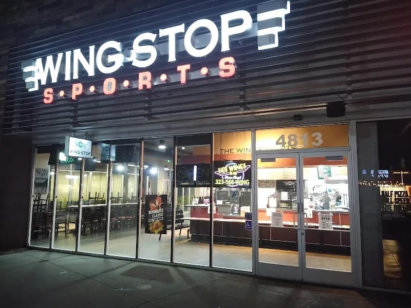 Wingstop storefront outside and inside view at 4813 Firestone Blvd in South Gate, California