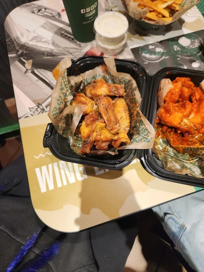 Wingstop storefront outside and inside view at 22 Chestnut Ave in South San Francisco, California