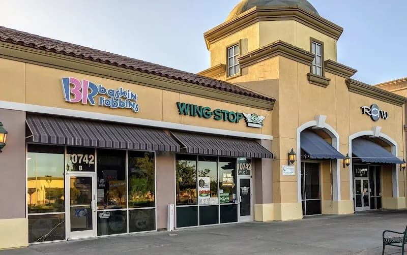 Wingstop storefront outside and inside view at 10742 Trinity Pkwy Ste C in Stockton, California