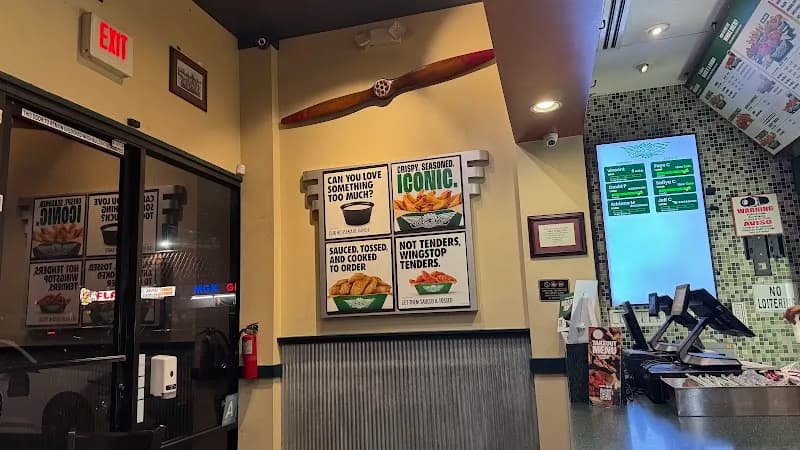 Wingstop storefront outside and inside view at 6102 Reseda Blvd in Tarzana, California