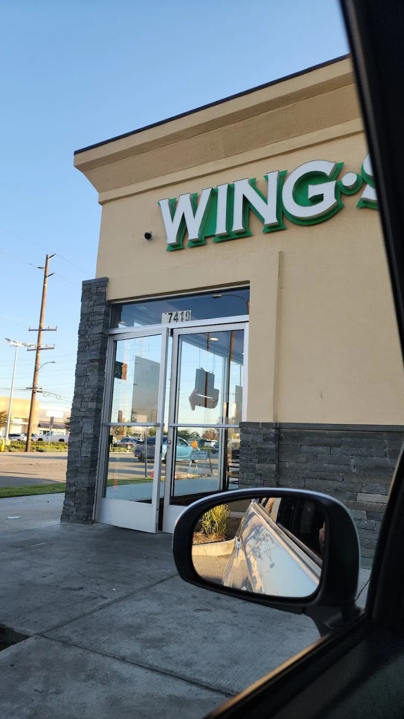 Wingstop storefront outside and inside view at 17419 Crenshaw Blvd in Torrance, California