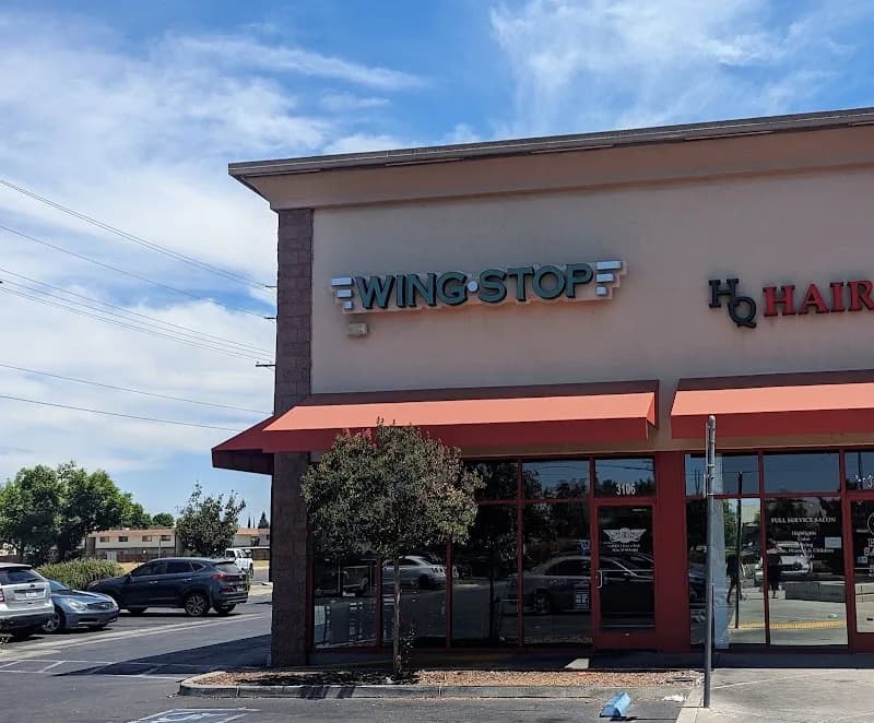 Wingstop storefront outside and inside view at 3102 Geer Rd Unit 103 in Turlock, California