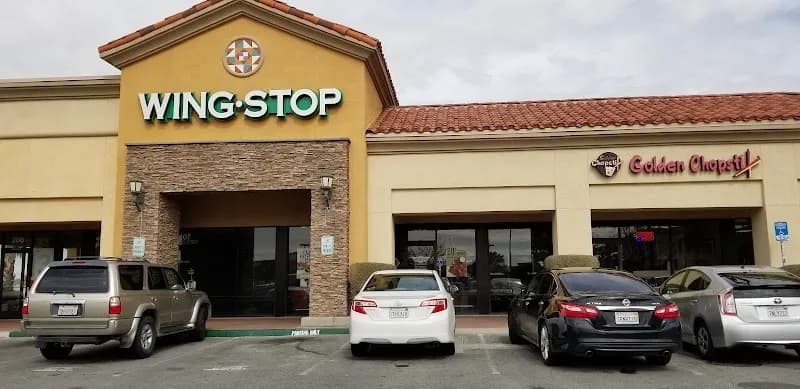 Wingstop storefront outside and inside view at 15683 Roy Rogers Dr. in Victorville, California