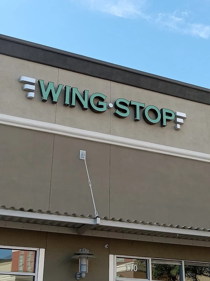 Wingstop storefront outside and inside view at 763 Ikea Ct Ste 110 in West Sacramento, California