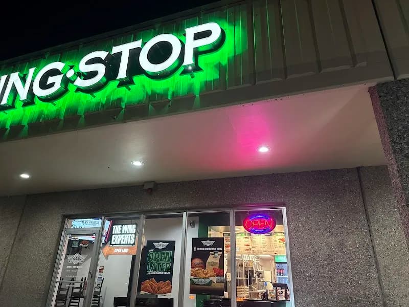Wingstop storefront outside and inside view at 1142 E. Fillmore Street in Colorado Springs, Colorado