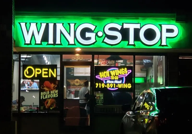 Wingstop storefront outside and inside view at 530 S Academy Blvd in Colorado Springs, Colorado